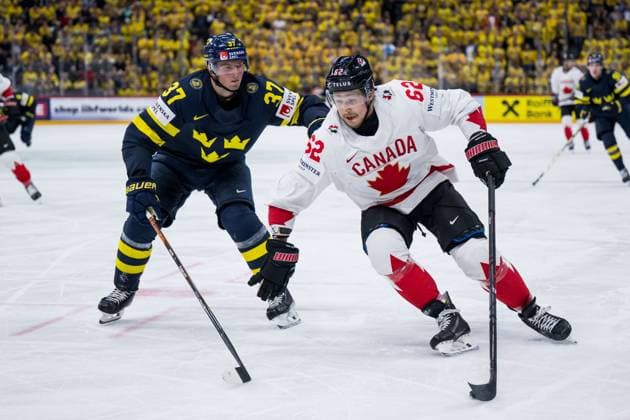 250520 Isac Lundeström of Sweden and Brandon Montour of Canada during the 2025 IIHF Ice hockey, Eishockey World Championship, WM, Weltmeisterschaft group stage game between Sweden and Canada on May 20, 2025 in Stockholm. Photo: Joel Marklund BILDBYRAN kod JM JM0689 ishockey ice hockey ishockey-vm 2025 vm 2025 iihf world championship sverige sweden kanada canada bbeng gruppspel Copyright: JOELxMARKLUND BB250520JM062