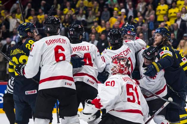 250520 Travis Konecny of Canada and Filip Forsberg of Sweden during the 2025 IIHF Ice hockey, Eishockey World Championship, WM, Weltmeisterschaft group stage game between Sweden and Canada on May 20, 2025 in Stockholm. Photo: Maxim ThorÃ BILDBYRAN kod MT JM0689 ishockey ice hockey ishockey-vm 2025 vm 2025 iihf world championship sverige sweden kanada canada bbeng gruppspel Copyright: MAXIMxTHORE BB250520MT117