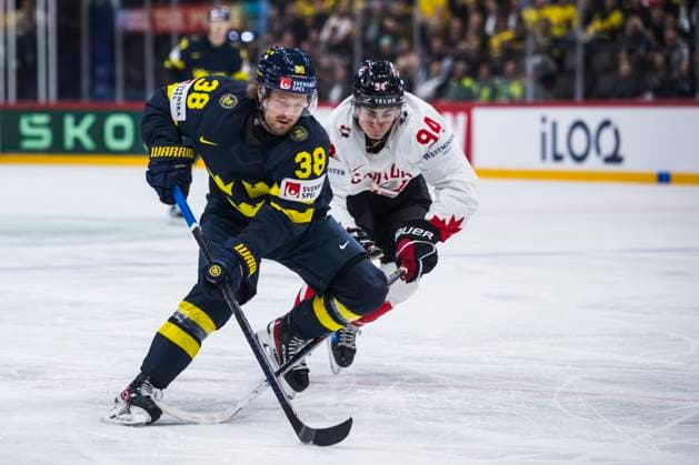 250520 Rasmus Sandin of Sweden and Porter Martone of Canada during the 2025 IIHF Ice hockey, Eishockey World Championship, WM, Weltmeisterschaft group stage game between Sweden and Canada on May 20, 2025 in Stockholm. Photo: Maxim ThorÃ BILDBYRAN kod MT JM0689 ishockey ice hockey ishockey-vm 2025 vm 2025 iihf world championship sverige sweden kanada canada bbeng gruppspel Copyright: MAXIMxTHORE BB250520MT120