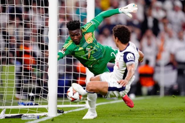 Andre Onana of Manchester United, ManU reaches for the ball but it is not enough to prevent Brennan Johnson of Tottenham Hotspur opening the scoring Tottenham Hotspur v Manchester United, Europa League Final, Football, San Mames Stadium, Bilbao, Spain - 21 May 2025 EDITORIAL USE ONLY No use with unauthorised audio, video, data, fixture lists, club league logos or live services. Online in-match use limited to 120 images, no video emulation. No use in betting, games or single club league player publications.  Copyright: xGokhanxTaner Shutterstockx 15312892ea