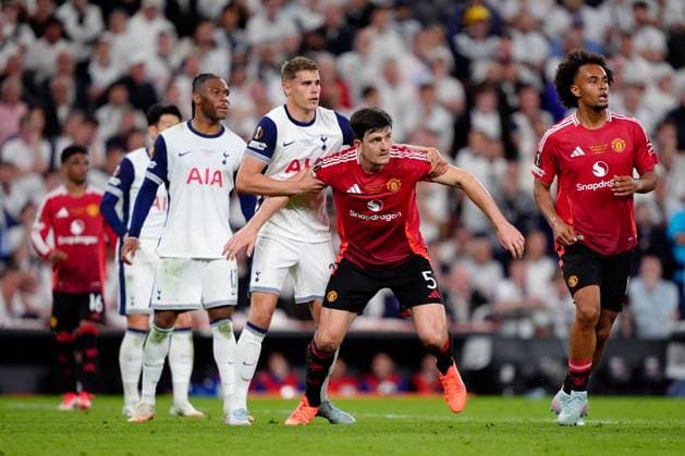 Micky Van de Ven of Tottenham Hotspur and Harry Maguire of Manchester United, ManU Tottenham Hotspur v Manchester United, Europa League Final, Football, San Mames Stadium, Bilbao, Spain - 21 May 2025 EDITORIAL USE ONLY No use with unauthorised audio, video, data, fixture lists, club league logos or live services. Online in-match use limited to 120 images, no video emulation. No use in betting, games or single club league player publications.  Copyright: xGokhanxTaner Shutterstockx 15312892fq