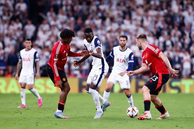 May 21, 2025, Bilbao, Vizcaya, Spain: Pape Matar Sarr of Tottenham and Luke Shaw of Manchester United, ManU in action during the Final UEFA Europa League football match played between Tottenham Hotspur FC and Manchester United at San Mames stadium on May 21, 2025, in Bilbao, Vizcaya, Spain. Bilbao Spain - ZUMAa181 20250521_zaa_a181_074 Copyright: xDennisxAgyemanx