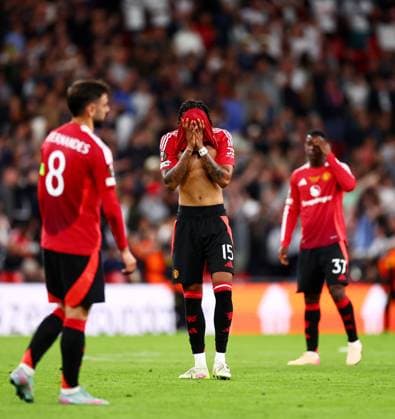 Leny Yoro of Manchester United, ManU and team mates look dejected. Tottenham Hotspur v Manchester United, Europa League Final, Football, San Mames Stadium, Bilbao, Spain - 21 May 2025 EDITORIAL USE ONLY No use with unauthorised audio, video, data, fixture lists, club league logos or live services. Online in-match use limited to 120 images, no video emulation. No use in betting, games or single club league player publications. Copyright: xJamesxMarsh Shutterstockx 15312890gg