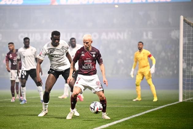 FC Metz v Stade de Reims - Playoffs Ligue 1 McDonald s Ligue 2 BKT 2024 2025, first leg 72 Amadou KONE (sdr) - 07 Gauthier HEIN (fcm) during the playoffs match between Metz and Reims at Stade Saint-Symphorien on May 21, 2025 in Metz, France. Metz France  Copyright: xFEPx 776325767