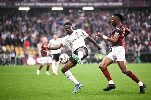 FC Metz v Stade de Reims - Playoffs Ligue 1 McDonald s Ligue 2 BKT 2024 2025, first leg 24 Mory GBANE (sdr) - 04 Urie-Michel MBOULA (fcm) during the playoffs match between Metz and Reims at Stade Saint-Symphorien on May 21, 2025 in Metz, France. Metz France  Copyright: xFEPx 776325767