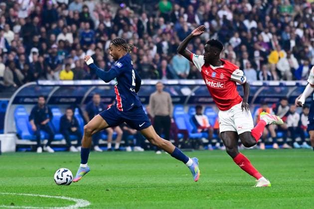 FOOTBALL : PSG vs Reims - Finale Coupe de France - 24 05 2025 Bradley Barcola ( 29 - PSG ) and Joseph Okumu ( 2 - Reims ) during the French Cup Final match between Paris Saint Germain and Stade de Reims at Stade de France on May 24 , 2025 in Saint Denis, France. ( Photo by Dante Badano PsnewZ ) - Saint DenisFrance  Copyright: xx