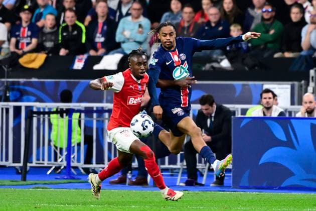 FOOTBALL : PSG vs Reims - Finale Coupe de France - 24 05 2025 Bradley Barcola ( 29 - PSG ) and Valentin ATANGANA EDOA ( 6 - Reims ) during the French Cup Final match between Paris Saint Germain and Stade de Reims at Stade de France on May 24 , 2025 in Saint Denis, France. ( Photo by Dante Badano PsnewZ ) - Saint DenisFrance  Copyright: xx