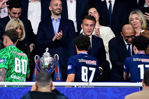 FOOTBALL : PSG vs Reims - Finale Coupe de France - 24 05 2025 Emmanuel Macron ( French president ) and Joao Pedro Goncalves Neves ( 87 - PSG ) during the French Cup Final match between Paris Saint Germain and Stade de Reims at Stade de France on May 24 , 2025 in Saint Denis, France. ( Photo by Dante Badano PsnewZ ) - Saint DenisFrance  Copyright: xx