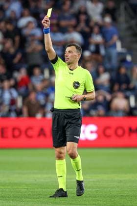 May 24, 2025: The official issues a yellow card to Sporting Kansas City midfielder Jacob Bartlett (16) during the second half against the New England Revolution at Childrens Mercy Park in Kansas City, KS. CSM Kansas City United States of America - ZUMAc04_ 20250524_zma_c04_428 Copyright: xDavidxSmithx