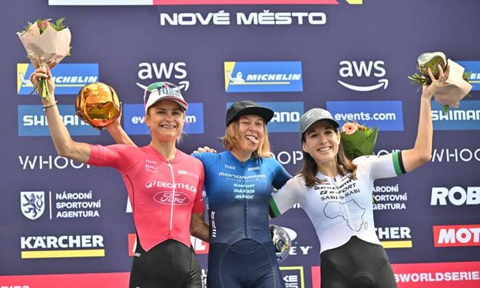 From left second Samara Maxwell of New Zealand, winner Mona Mitterwallner of Austria, third Candice Lill of South Africa after women elite race during Mountain bike cross country World Cup event on podium, Nove Mesto na Morave, Czech Republic, May 25, 2025. (CTKxPhoto LubosxPavlicek) CTKPhotoP2025052502190  CTKPhotoP2025052502190