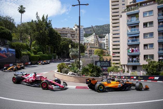 Sport Themen der Woche KW21 Sport Bilder des Tages MONACO - Oscar Piastri (McLaren) and Charles Leclerc (Ferrari )during the start of the Monaco Grand Prix at the Circuit de Monaco. ANP SANDER KING xVIxANPxSportx xxANPxIVx 528639237 originalFilename: 528639237.jpg