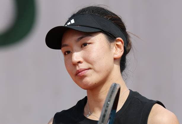 (250526) -- PARIS, May 26, 2025 -- Wang Xinyu reacts during the women s singles first round match between Wang Xinyu of China and Emma Raducanu of Britain at the French tennis tournament at Roland Garros in Paris, France, on May 26, 2025. ) (SP)FRANCE-PARIS-TENNIS-FRENCH OPEN-WOMEN S SINGLES GaoxJing 
