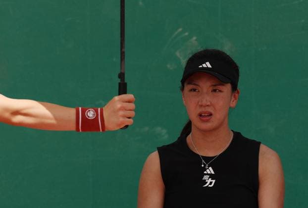 (250526) -- PARIS, May 26, 2025 -- Wang Xinyu reacts during the women s singles first round match between Wang Xinyu of China and Emma Raducanu of Britain at the French tennis tournament at Roland Garros in Paris, France, on May 26, 2025. ) (SP)FRANCE-PARIS-TENNIS-FRENCH OPEN-WOMEN S SINGLES GaoxJing 