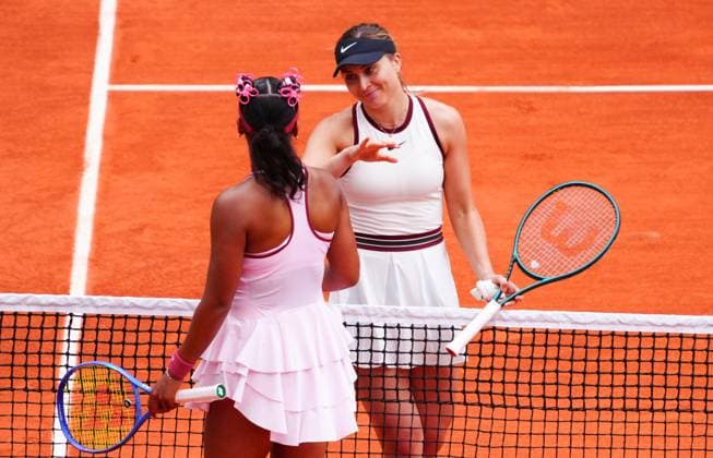 Paula Badosa consoles Naomi Osaka at the net after her first round win French Open Tennis, Day Two, Tennis, Roland Garros, Paris, France - 26 May 2025 EDITORIAL USE ONLY No use with unauthorised audio, video, data, fixture lists, club league logos or live services. Online in-match use limited to 120 images, no video emulation. No use in betting, games or single club league player publications. Copyright: xJavierxGarcia Shutterstockx 15314619as