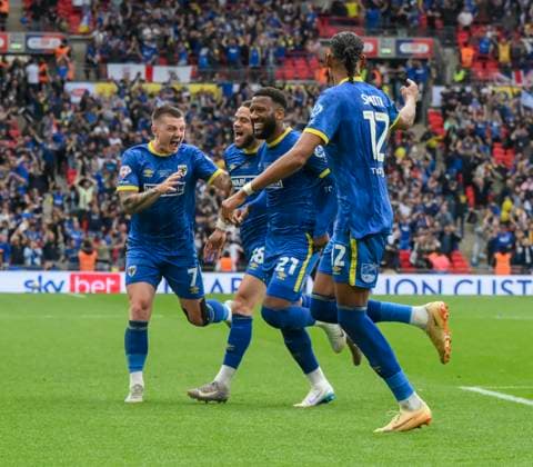AFC Wimbledon v Walsall Sky Bet League 2 Myles Hippolyte of AFC Wimbledon celebrates scoring the first goal for his team during the Sky Bet League 2 Play-Off Final between AFC Wimbledon and Walsall at Wembley Stadium, London UK Newspapers OUT Copyright: xMalcolmxFellx FIL-21846-0016