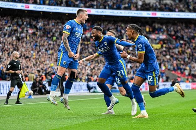 AFC Wimbledon v Walsall - Sky Bet League 2 Play Off Final Myles Hippolyte (21 AFC Wimbledon) celebrates after scoring the team s first goal during the Sky Bet League 2 Play Off Final match between AFC Wimbledon and Walsall at Wembley Stadium in London, England, on May 26, 2025. London Greater London United Kingdom  Copyright: xMIxNewsx originalFilename:fletcher-afcwimbl250526_np5vo.jpg