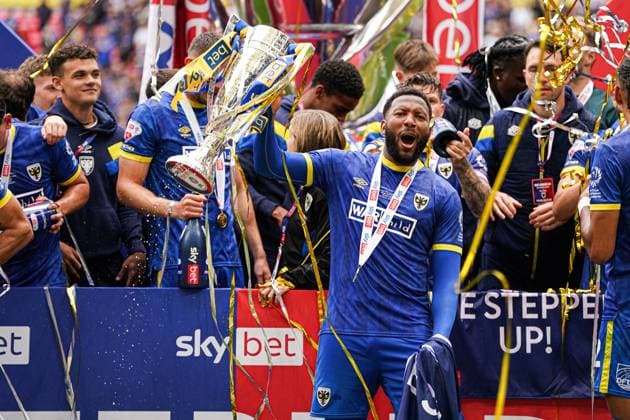 Sky Bet League 2 Playoff Final AFC Wimbledon v Walsall Myles Hippolyte of AFC Wimbledon celebrating after the Sky Bet League 2 Playoff Final match AFC Wimbledon vs Walsall at Wembley Stadium, London, United Kingdom, 26th May 2025 (Photo by Harvey Murphy News Images) Copyright: xHarveyxMurphy NewsxImagesx