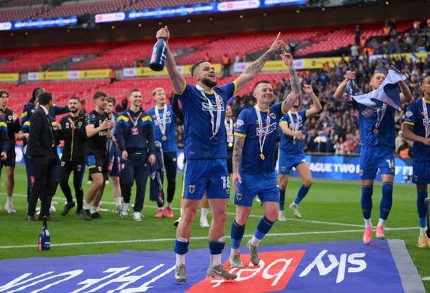 Football - 2024 2025 EFL Sky Bet League Two - Play-Offs - Final - AFC Wimbledon vs Walsall - Wembley Stadium - Monday 26th May 2025. AFC Wimbledon s Marcus Browne celebrates their 1 0 victory and promotion to League One. COLORSPORT Ashley Western 