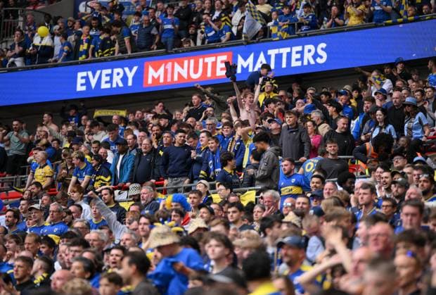 Football - 2024 2025 EFL Sky Bet League Two - Play-Offs - Final - AFC Wimbledon vs Walsall - Wembley Stadium - Monday 26th May 2025. AFC Wimbledon fans celebrate as Myles Hippolyte scores the opening goal. COLORSPORT Ashley Western 