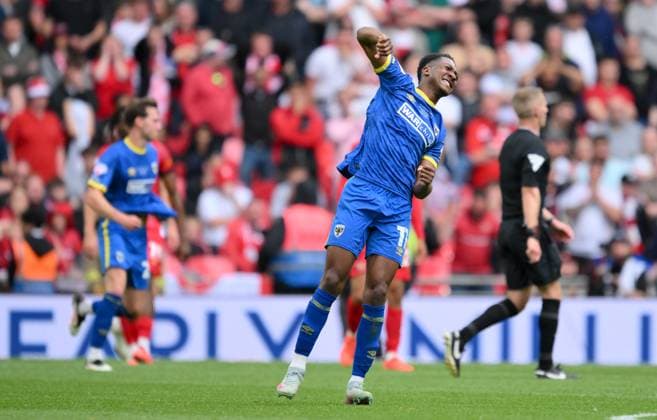 Football - 2024 2025 EFL Sky Bet League Two - Play-Offs - Final - AFC Wimbledon vs Walsall - Wembley Stadium - Monday 26th May 2025. AFC Wimbledon s Josh Neufville celebrates the opening goal scored by Myles Hippolyte. COLORSPORT Ashley Western 