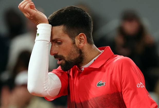 Novak Djokovic of Serbia plays against Mackenzie McDonald of the US during their first-round match at the French Tennis Open in Roland Garros in Paris, France, on Tuesday, May 27, 2025. Djokovic won 6-3, 6-3, 6-3.  PAR20250527303 MAYAxVIDON-WHITE