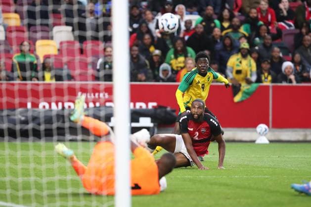 Bilder des Jahres 2025, Sport 05 Mai Sport Bilder des Tages Kaheem Dixon of Jamaica has hit shot on goal saved by Trinidad and Tobago goalkeeper Marvin Phillip Jamaica v Trinidad and Tobago, Football, The Unity Cup, Gtech Community Stadium, London, UK, 27 05 25 EDITORIAL USE ONLY No use with unauthorised audio, video, data, fixture lists (outside the EU), club league logos or live services. Online in-match use limited to 45 images (+15 in extra time). No use to emulate moving images. No use in betting, games or  Copyright: xAnthonyxHanc Shutterstockx 15324673n