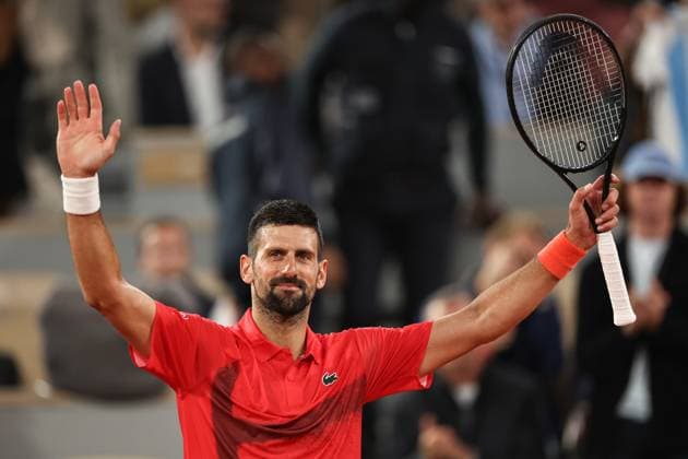 (250528) -- PARIS, May 28, 2025 -- Novak Djokovic celebrates after winning the men s singles first round match between Mackenzie Mcdonald of the United States and Novak Djokovic of Serbia at the French Open tennis tournament at Roland Garros, Paris, France, May 27, 2025. ) (SP)FRANCE-PARIS-TENNIS-FRENCH OPEN-MEN S SINGLES LixJing 
