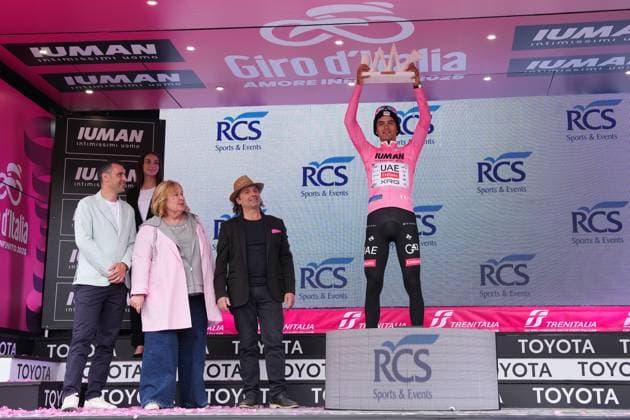 Del Toro Romero Isaac of Uae Team Emirates Xrg, pink jersey, celebrates his victory on the podium after winning the stage 17 of the Giro d™Italia from San Michele all™Adige (fondazione Edmund Mach) to Bormio, Italy - Wednesday, May 28, 2025. - cycling.  Copyright: xGianxMatttiaxD Alberto LaPressex