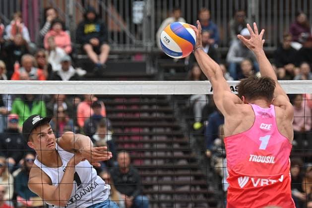 Miles Partain of USA, left, and Tadeas Trousil of Czech Republic in action during the Groupe D men match Tadeas Trousil and Matyas Dzavoronok of Czech Republic vs Miles Partain and Andrew Benesh of USA at the Pro Tour Elite Beach volleyball, Beachvolleyball tournament in Ostrava, Czech Republic, May 29, 2025. (CTKxPhoto JaroslavxOzana) CTKPhotoP2025052903905  CTKPhotoP2025052903905