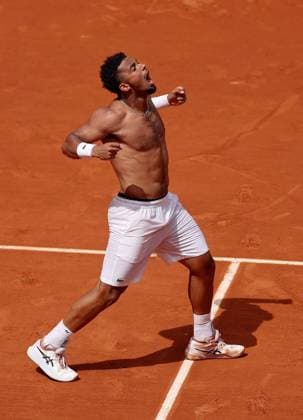 Arthur Fils of France celebrates ripping off his shirt following his win French Open Tennis, Day Five, Tennis, Roland Garros, Paris, France - 29 May 2025 EDITORIAL USE ONLY No use with unauthorised audio, video, data, fixture lists, club league logos or live services. Online in-match use limited to 120 images, no video emulation. No use in betting, games or single club league player publications. Copyright: xEllaxLing Shutterstockx 15328391aq