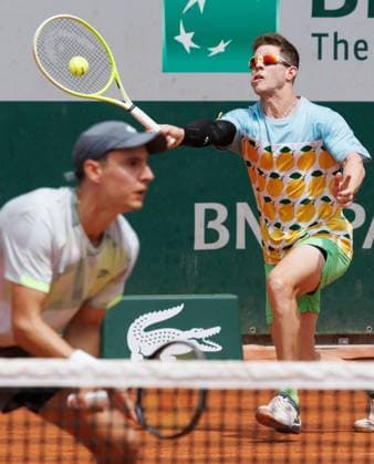 Belgian Joran Vliegen and Uruguayan Ariel Behar pictured in action during a doubles tennis match between Belgian-Uruguayan pair Vliegen - Behar and Monegasque-French pair Nys - Roger-Vasselin, in the first round of the men s doubles at the Roland Garros Grand Slam tennis tournament, Thursday 29 May 2025 in Paris, France. The 2025 edition of Roland Garros takes place from May 24th to June 8th 2025. BENOITxDOPPAGNE  x125610749x