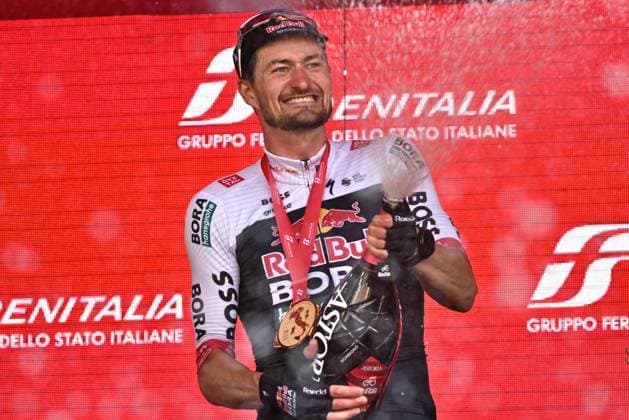 May 29, 2025, Cesano Maderno, ITALY: German rider Nico Denz of Red Bull - Bora - Hansgrohe, poses on the podium after winning the 18th stage of the 108 Giro d Italia 2025, cycling race over 144 km from Morbegno to Cesano Maderno, 29 May 2025. ANSA LUCA ZENNARO. Giro: Denz Vince A Cesano Maderno, Del Toro In Rosa  - ZUMAa110 20250529_zaf_a110_043 Copyright: xLucaxZennarox