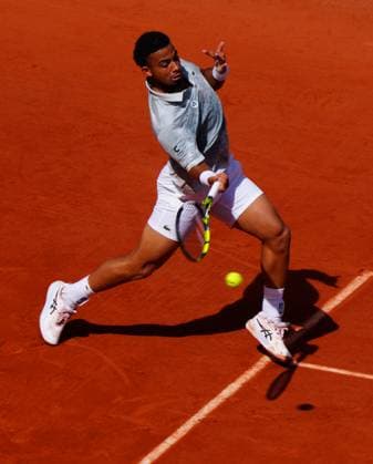 Arthur Fils in second round action French Open Tennis, Day Five, Tennis, Roland Garros, Paris, France - 29 May 2025 EDITORIAL USE ONLY No use with unauthorised audio, video, data, fixture lists, club league logos or live services. Online in-match use limited to 120 images, no video emulation. No use in betting, games or single club league player publications. Copyright: xJavierxGarcia Shutterstockx 15328390ft