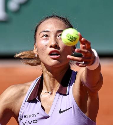 (250530) -- PARIS, May 30, 2025 -- Zheng Qinwen serves during the women s singles 3rd round match between Zheng Qinwen of China and Victoria Mboko of Canada at the French Open tennis tournament at Roland Garros, Paris, France, May 30, 2025. ) (SP)FRANCE-PARIS-TENNIS-FRENCH OPEN-WOMEN S SINGLES LixJing 