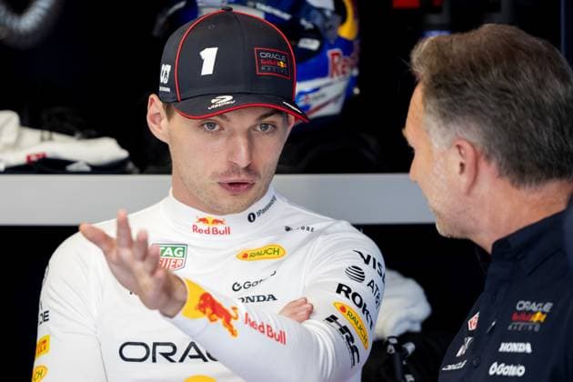 BARCELONA - Max Verstappen (Red Bull Racing) in conversation with Team boss Christian Horner prior to the first free practice session ahead of the Spanish Grand Prix. ANP SANDER KING xVIxANPxSportx xxANPxIVx 529001315 originalFilename: 529001315.jpg