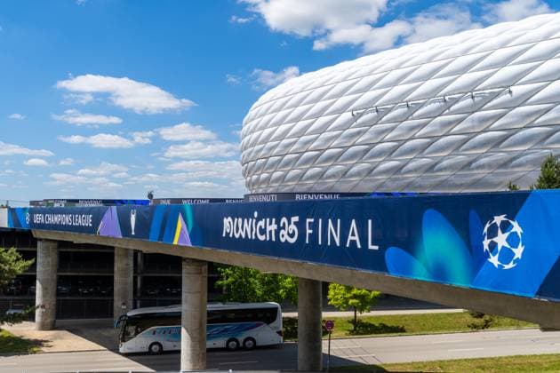 Munich, Bavaria, Germany - May 30, 2025: Banner in front of the arena with UEFA logo and lettering Munich 25 Final for the final match. Impressions of the Munich Football Arena one day before the UEFA Champions League final between Inter Milan and Paris Saint-Germain PSG