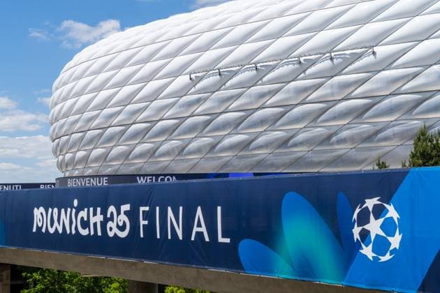 Munich, Bavaria, Germany - May 30, 2025: Banner in front of the arena with UEFA logo and lettering Munich 25 Final for the final match. Impressions of the Munich Football Arena one day before the UEFA Champions League final between Inter Milan and Paris Saint-Germain PSG