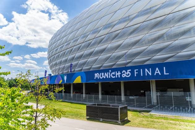 Munich, Bavaria, Germany - May 30, 2025: Banner in front of the arena with UEFA logo and lettering Munich 25 Final for the final match. Impressions of the Munich Football Arena one day before the UEFA Champions League final between Inter Milan and Paris Saint-Germain PSG
