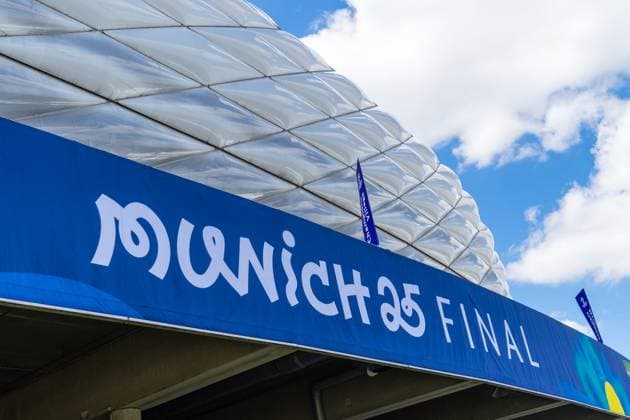 Munich, Bavaria, Germany - May 30, 2025: Banner in front of the arena with UEFA logo and lettering Munich 25 Final for the final match. Impressions of the Munich Football Arena one day before the UEFA Champions League final between Inter Milan and Paris Saint-Germain PSG