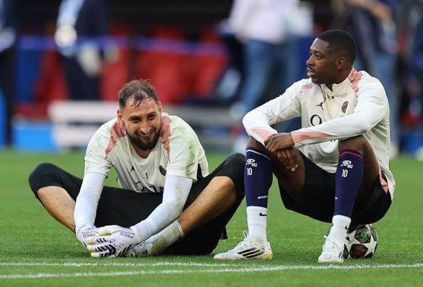 Gianluigi Donnarumma of Paris Saint-Germain and Ousmane Dembele of Paris Saint-Germain Paris Saint-Germain Training Session, UEFA Champions League Final, Football, Allianz Arena, Munich, Germany - 30 May 2025 EDITORIAL USE ONLY No use with unauthorised audio, video, data, fixture lists, club league logos or live services. Online in-match use limited to 120 images, no video emulation. No use in betting, games or single club league player publications. Copyright: xMichaelxZemanek Shutterstockx 15330915p