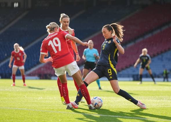 Verena Hanshaw of Austria Women & Caroline Weir of Scotland Women challenge for the ball. Scotland Women v Austria Women, UEFA Women s Nations League - League A - Group 1, Football, Hampden Park, Glasgow, Scotland, UK - 30 May 2025 EDITORIAL USE ONLY No use with unauthorised audio, video, data, fixture lists, club league logos or live services. Online in-match use limited to 120 images, no video emulation. No use in betting, games or single club league player publications. Copyright: xStuartxWallace Shutterstockx 15330905h