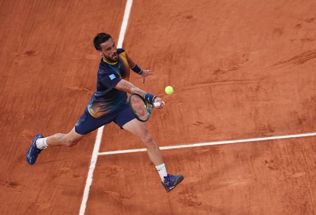 (250531) -- PARIS, May 31, 2025 -- Damir Dzumhur of Bosnia and Herzegovina returns the shot during the men s singles third round match against Carlos Alcaraz of Spain at the French Open tennis tournament at Roland Garros, Paris, France, May 30, 2025. ) (SP)FRANCE-PARIS-TENNIS-FRENCH OPEN-MEN S SINGLES LixJing 