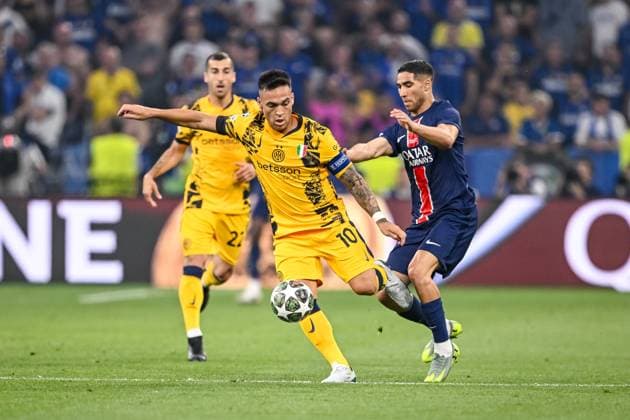 Lautaro Martinez (FC Internazionale Milano) und Achraf Hakimi (Paris Saint-Germain) battle for the ball during the UEFA Champions League Final 2025 between Paris Saint-Germain and FC Internazionale Milano at Munich Football Arena on May 31, 2025 in Munich, Germany. (Photo by Harry Langer DeFodi Images)