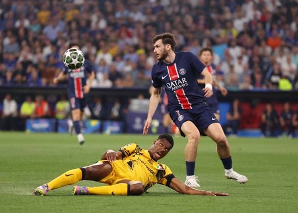 Munich, Germany, 31st May 2025. Denzel Dumfries of Inter Milan and Khvicha Kvaratskhelia of Paris St Germain during the Paris Saint Germain vs Internazionale UEFA Champions League Final match at Munich Football Arena, Munich. Picture credit should read: David Klein Sportimage EDITORIAL USE ONLY. No use with unauthorised audio, video, data, fixture lists, club league logos or live services. Online in-match use limited to 120 images, no video emulation. No use in betting, games or single club league player publications. SPI_065_DK_UCL_Final SPI-3964-0062
