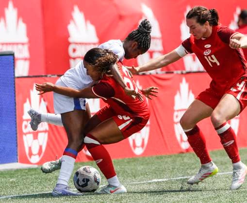 May 31, 2025, Winnipeg, Mb, CANADA: Canada s Olivia Smith (23) and Vanessa Gilles (14) defend against Haiti s Batcheba Louis (7) during second half soccer action in Winnipeg, Saturday, May 31, 2025. Haiti Canada Womens Soccer  - ZUMAc35_ 20250531_zaf_c35_103 Copyright: xJohnxWoodsx