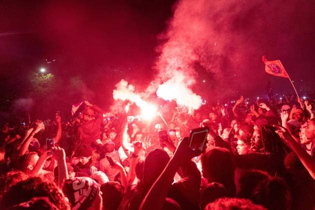 May 31, 2025, Paris, France, FRA: Outside the Parc des Princes, a sea of joy and fireworks: Paris Saint-Germain fans erupt in celebration after their teamâ€⠢s stunning 5-0 triumph over Inter Milan in Munich. With this historic victory, PSG becomes only the second French football clubâ€after Olympique de Marseille in 1993â€to lift the UEFA Champions League trophy. A night of chants, flags, and tears of happiness marked a long-awaited moment for supporters across the capital. However, the festivities were marred by clashes between some groups of fans and the police, with several cars set on fire and tensions flaring in the surrounding streets. Paris FRA - ZUMAl224 0821125921st Copyright: xStefanoxLorussox