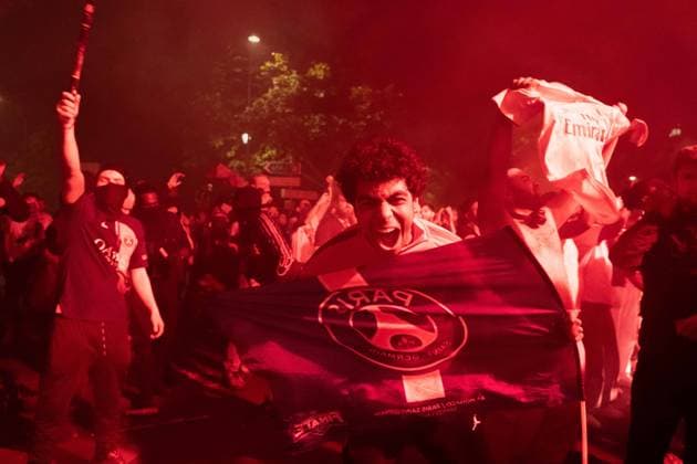 June 1, 2025, Paris, France, FRA: Outside the Parc des Princes, a sea of joy and fireworks: Paris Saint-Germain fans erupt in celebration after their teamâ€⠢s stunning 5-0 triumph over Inter Milan in Munich. With this historic victory, PSG becomes only the second French football clubâ€after Olympique de Marseille in 1993â€to lift the UEFA Champions League trophy. A night of chants, flags, and tears of happiness marked a long-awaited moment for supporters across the capital. However, the festivities were marred by clashes between some groups of fans and the police, with several cars set on fire and tensions flaring in the surrounding streets. Paris FRA - ZUMAl224 0821126059st Copyright: xStefanoxLorussox