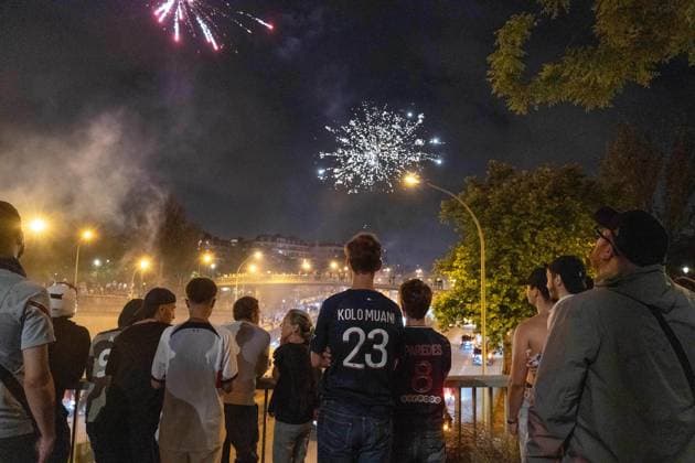 June 1, 2025, Paris, France, FRA: Outside the Parc des Princes, a sea of joy and fireworks: Paris Saint-Germain fans erupt in celebration after their teamâ€⠢s stunning 5-0 triumph over Inter Milan in Munich. With this historic victory, PSG becomes only the second French football clubâ€after Olympique de Marseille in 1993â€to lift the UEFA Champions League trophy. A night of chants, flags, and tears of happiness marked a long-awaited moment for supporters across the capital. However, the festivities were marred by clashes between some groups of fans and the police, with several cars set on fire and tensions flaring in the surrounding streets. Paris FRA - ZUMAl224 0821126400st Copyright: xStefanoxLorussox