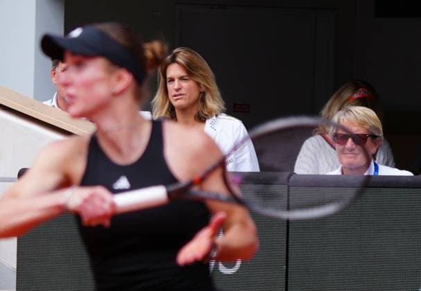Tournament Director Amelie Mauresmo looks on as Elina Svitolina plays a forehand during her fourth round match against Jasmine Paolini which was first up on Philippe Chatrier Court. A match that went to three sets and lasted nearly three and a half hours French Open Tennis, Day Eight, Tennis, Roland Garros, Paris, France - 01 Jun 2025 EDITORIAL USE ONLY No use with unauthorised audio, video, data, fixture lists, club league logos or live services. Online in-match use limited to 120 images, no video emulation. No use in betting, games or single club league player publications. Copyright: xJavierxGarcia Shutterstockx 15334656ab