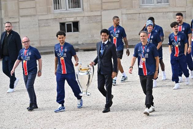 PSG celebrates UCL victory in Elysee Palace PARIS, FRANCE - JUNE 01: Marquinhos (3rd L), head coach Luis Enrique (2nd R) and the President,Nasser Al-Khelaifi (C) of Paris Saint Germain, carry the UEFA Champions League trophy at Elysee Palace in Paris, France on June 01, 2025. Mustafa Yalcin Anadolu Paris France. Editorial use only. Please get in touch for any other usage.  Copyright: x2025xAnadoluxMustafaxYalcinx